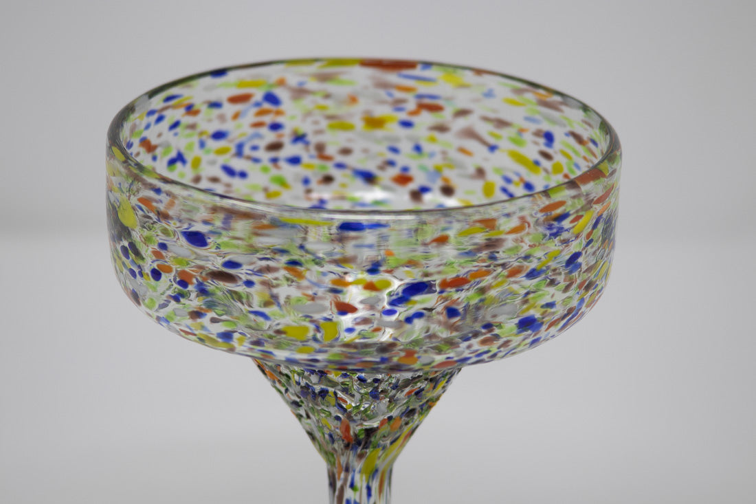 Close up detail of a margarita glass with confetti rock details